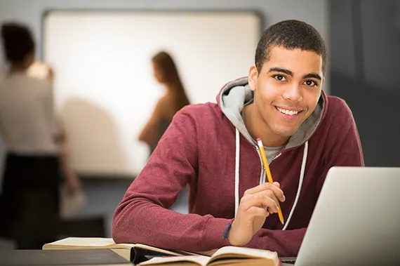Image of a student working on a computer